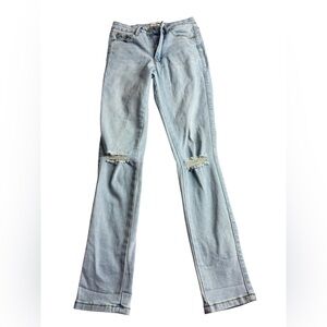 Fashion Nova Light Blue Flare Jeans with Knee Rips